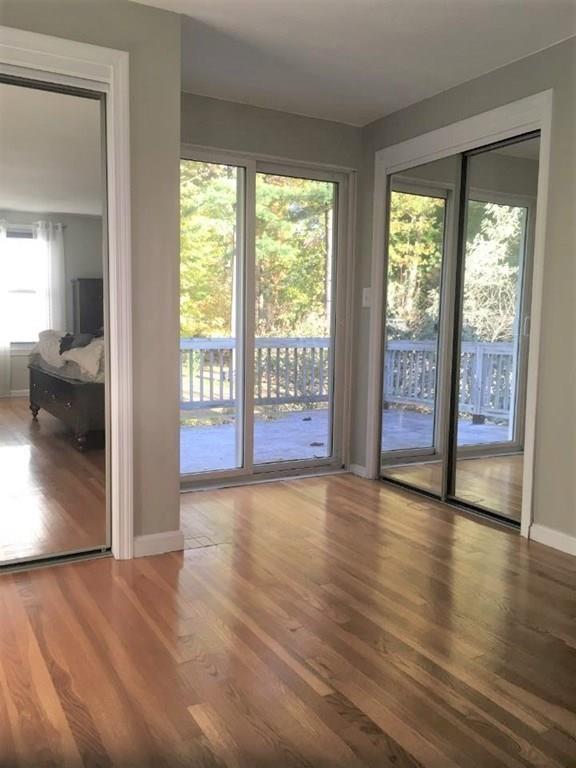 1 Edgar Road Billerica, MA 01821 - Photo 25 of 32 a view of an empty room with wooden floor and a window