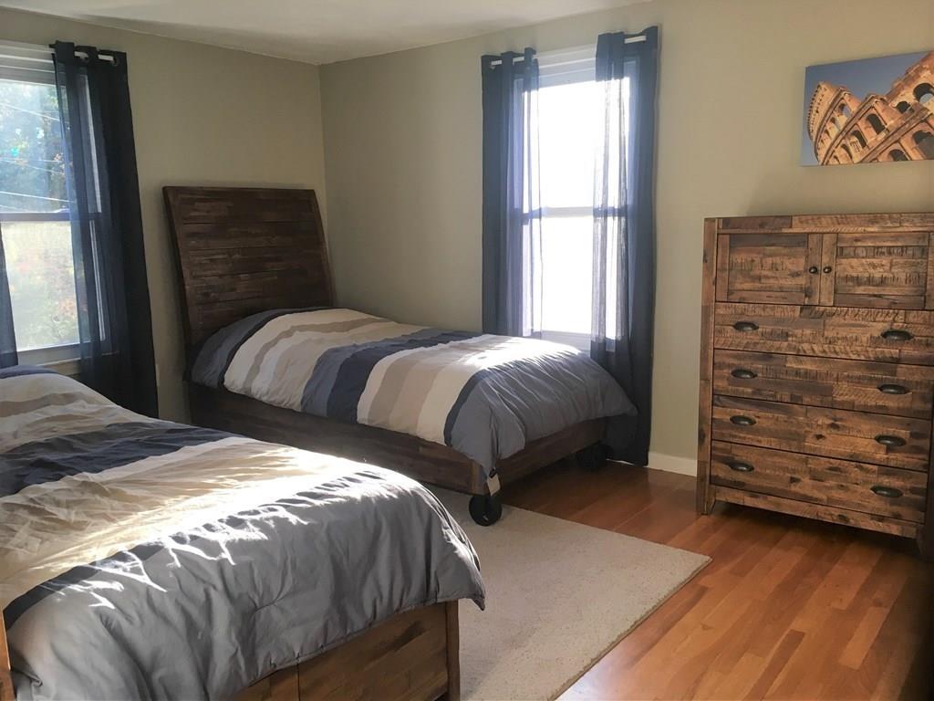 1 Edgar Road Billerica, MA 01821 - Photo 26 of 32 a bedroom with a bed and a window
