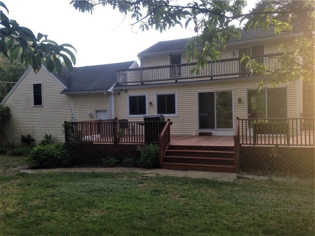 1 Edgar Road Billerica, MA 01821 - Photo 6 of 32 a front view of a house with a yard