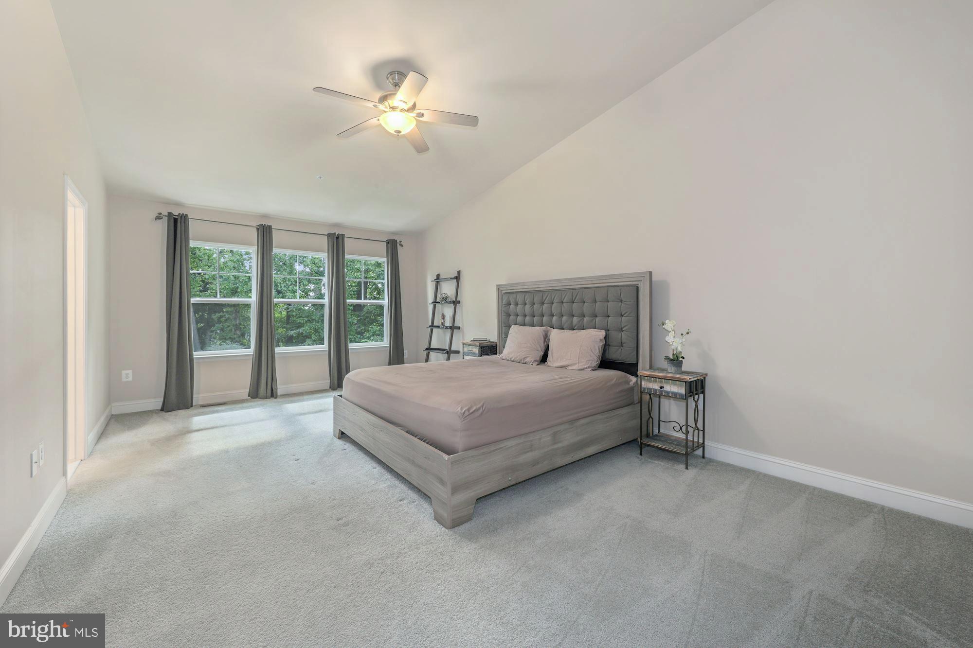 14407 Vedanta Way Silver Spring, MD 20906 - Photo 13 of 31 Large master bedroom with cathedral ceiling