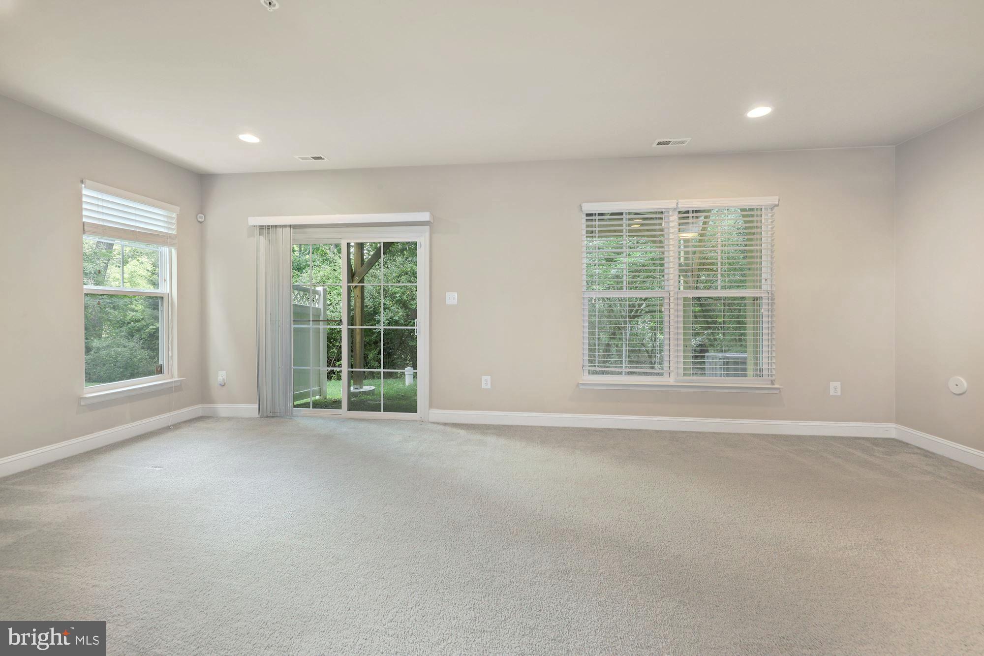 14407 Vedanta Way Silver Spring, MD 20906 - Photo 24 of 31 Walkout to private backyard
