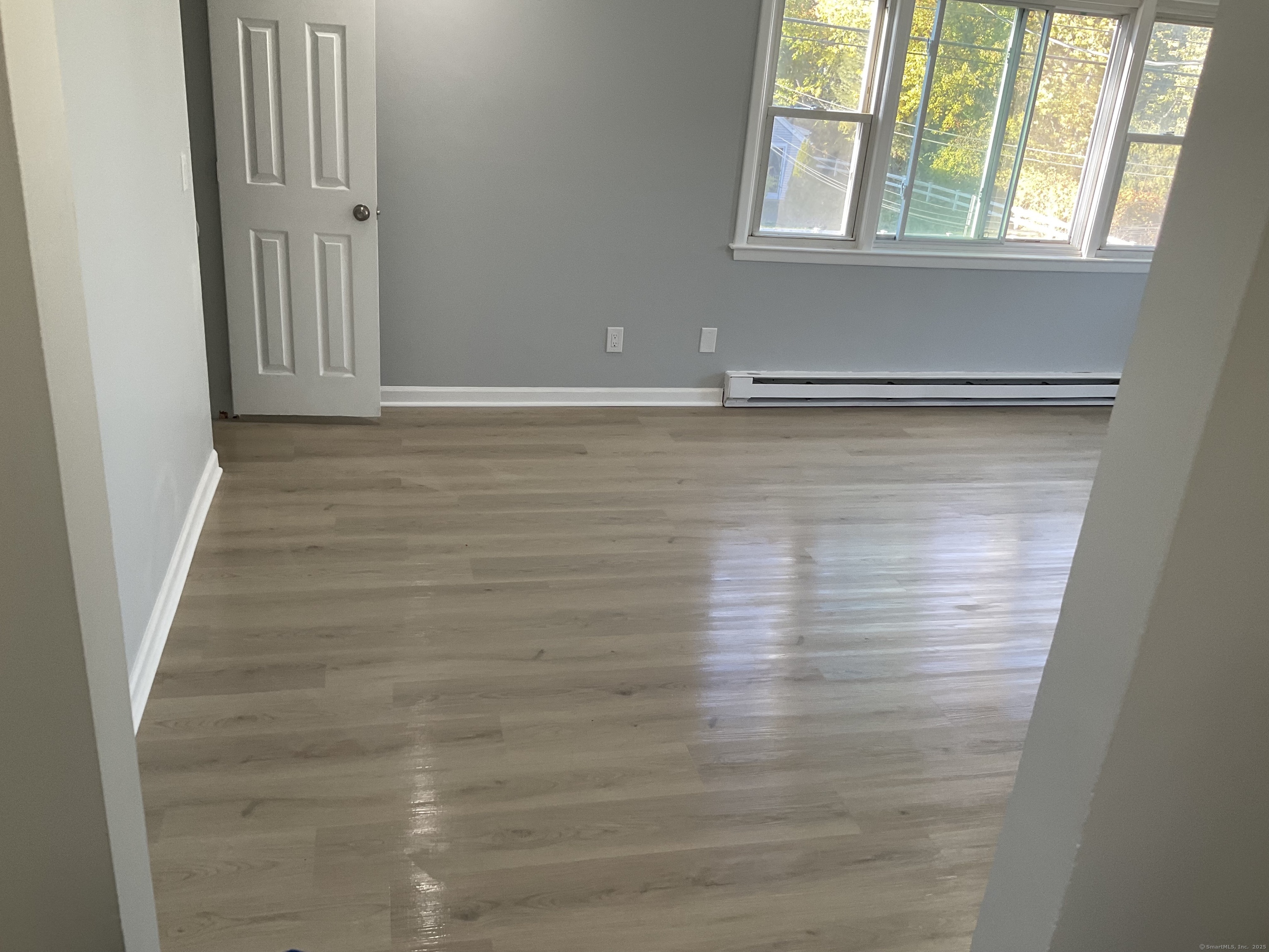 641 Middletown Avenue, Unit 2 New Haven, CT 06513 - Photo 17 of 20 a view of empty room with window