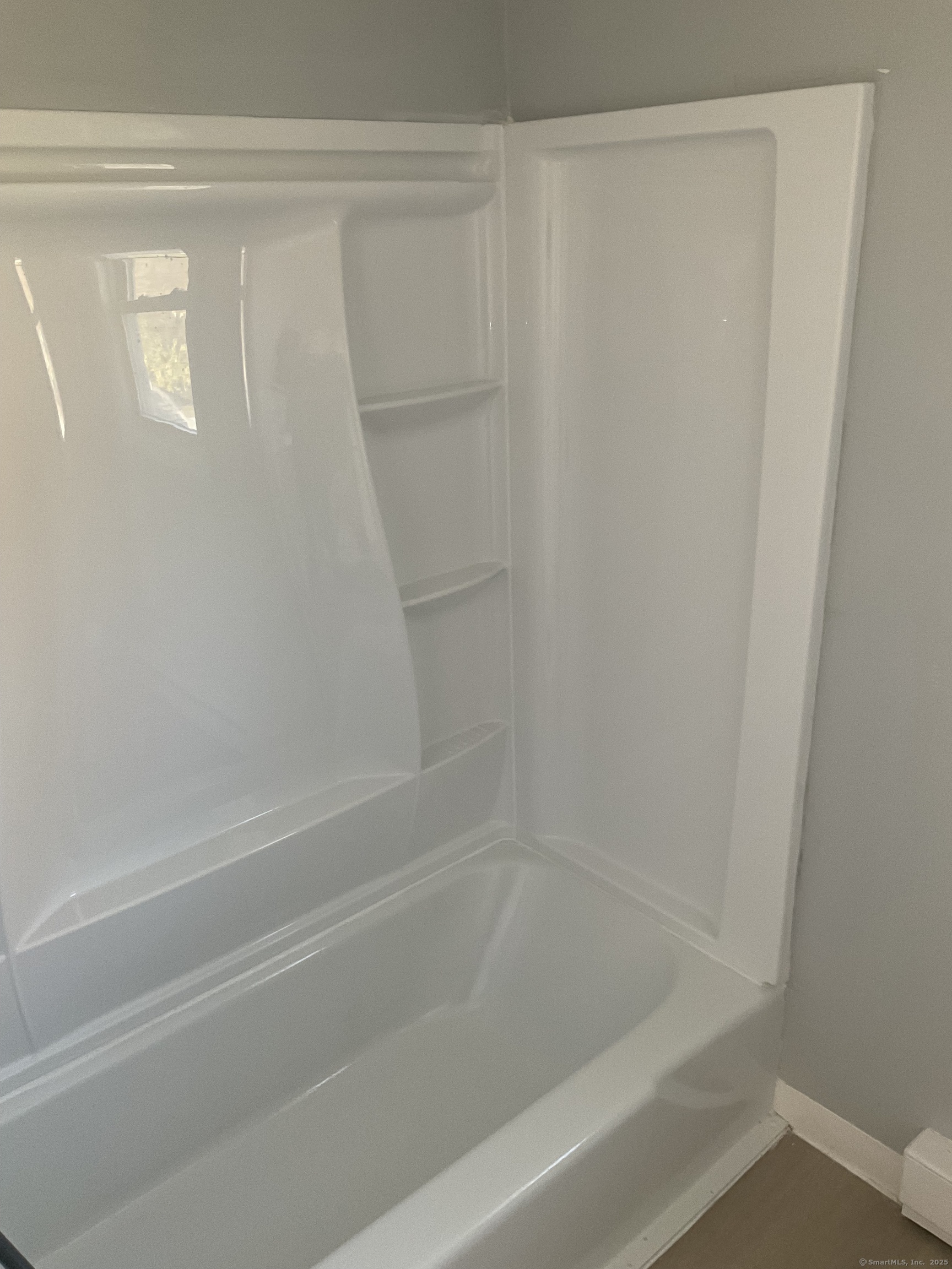 641 Middletown Avenue, Unit 2 New Haven, CT 06513 - Photo 7 of 20 a close view of a bathtub in bathroom