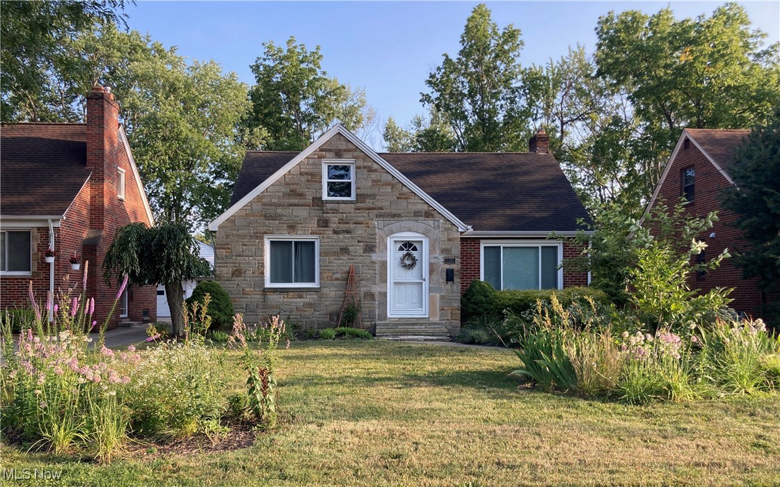 21475 Eaton Road Cleveland, OH 44126 - Photo 1 of 31 View of front facade featuring a front yard
