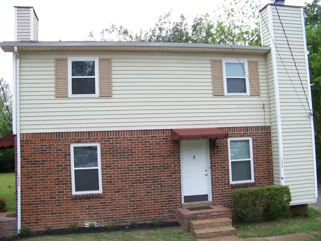 a view of a house with a garage