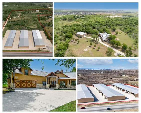 an aerial view of residential houses with outdoor space