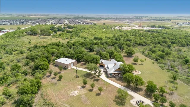 a view of a city with an ocean