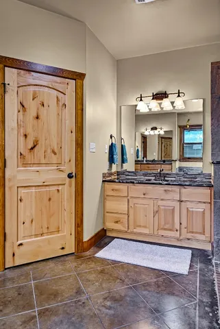 a work room with furniture and a window
