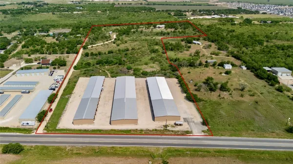 an aerial view of residential house with outdoor space