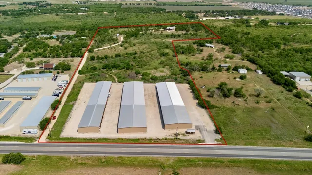 an aerial view of residential house with outdoor space