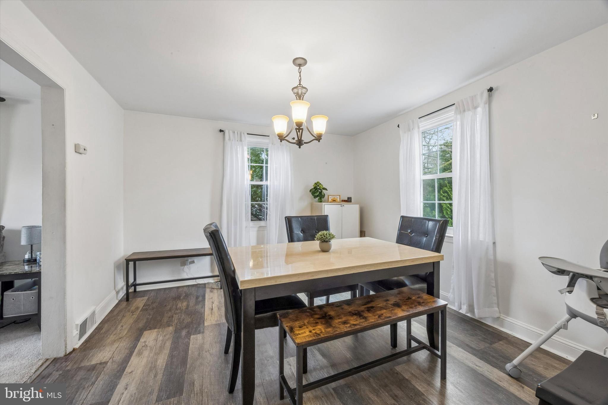 354 East Springfield Road Springfield, PA 19064 - Photo 5 of 22 a view of a dining room with furniture window and wooden floor