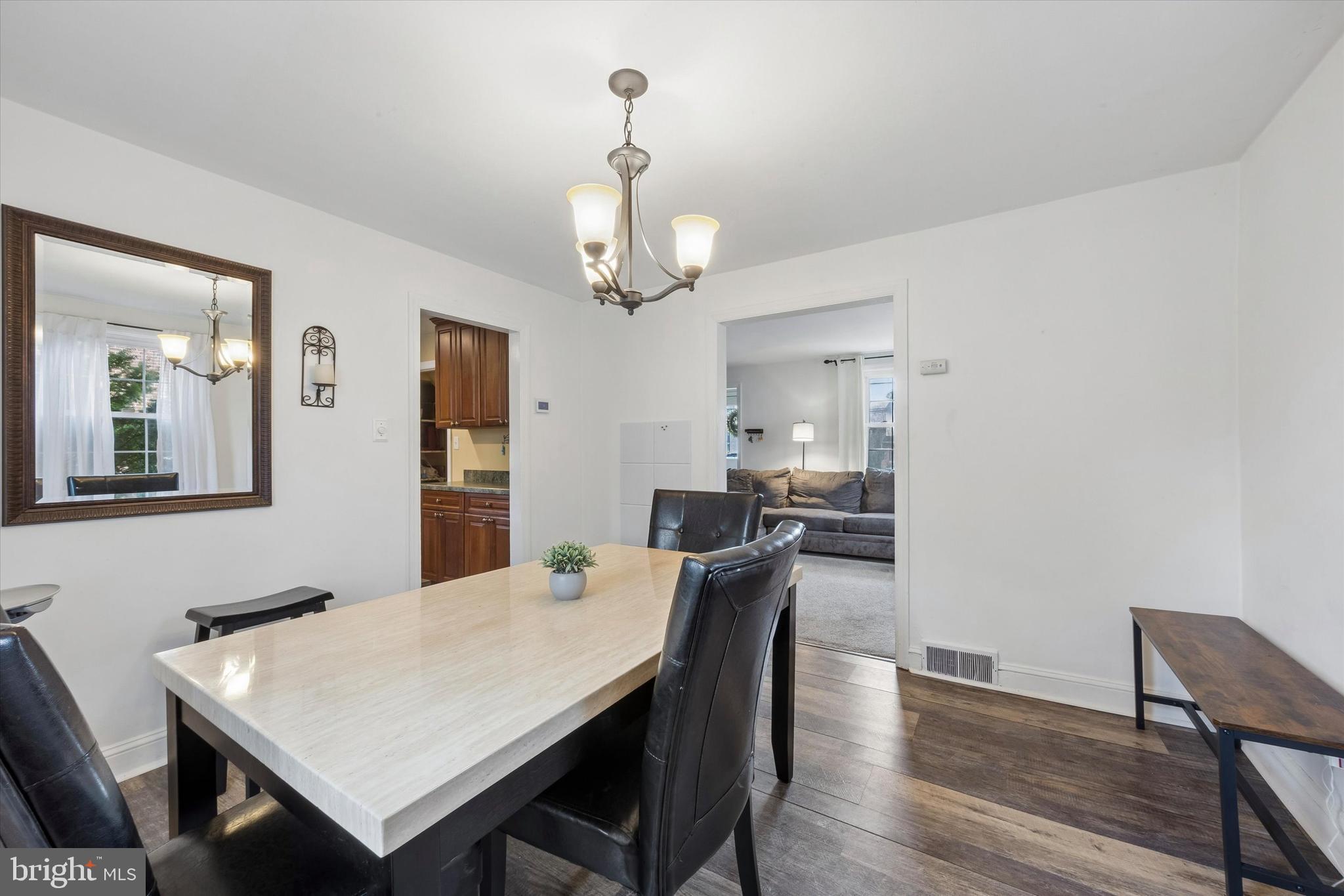 354 East Springfield Road Springfield, PA 19064 - Photo 6 of 22 a view of a dining room with furniture and wooden floor