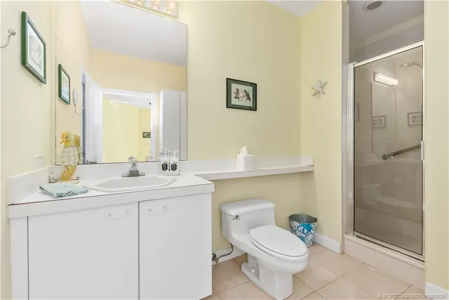 a view of a chairs and table in the balcony