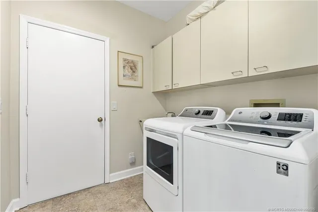 a view of a garden with patio