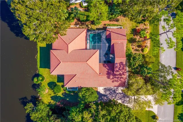 a view of a lake with a house in the background