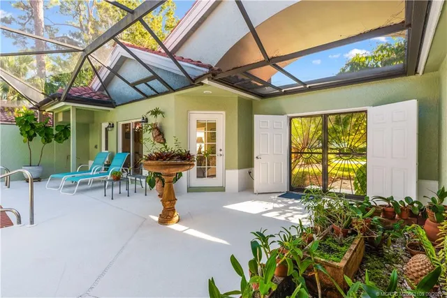 a view of a balcony with a swimming pool