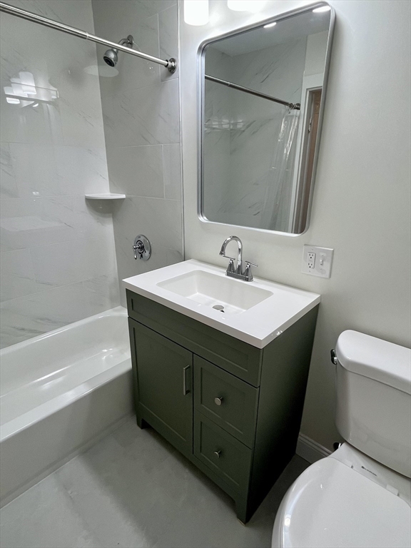 370 A Centre Street, Unit 2 Boston, MA 02130 - Photo 5 of 10 a bathroom with a sink toilet and shower