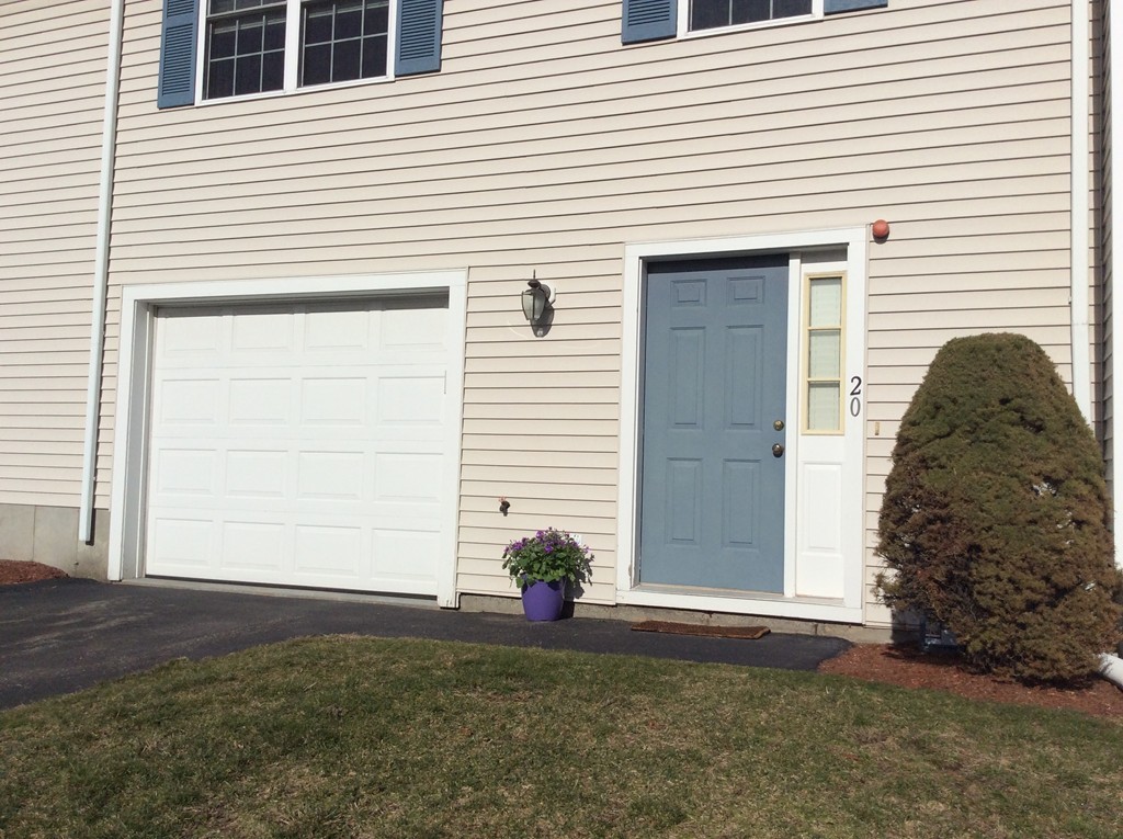 985 Trapelo Road, Unit 20 Waltham, MA 02452 - Photo 2 of 16 a view of a house with a garage