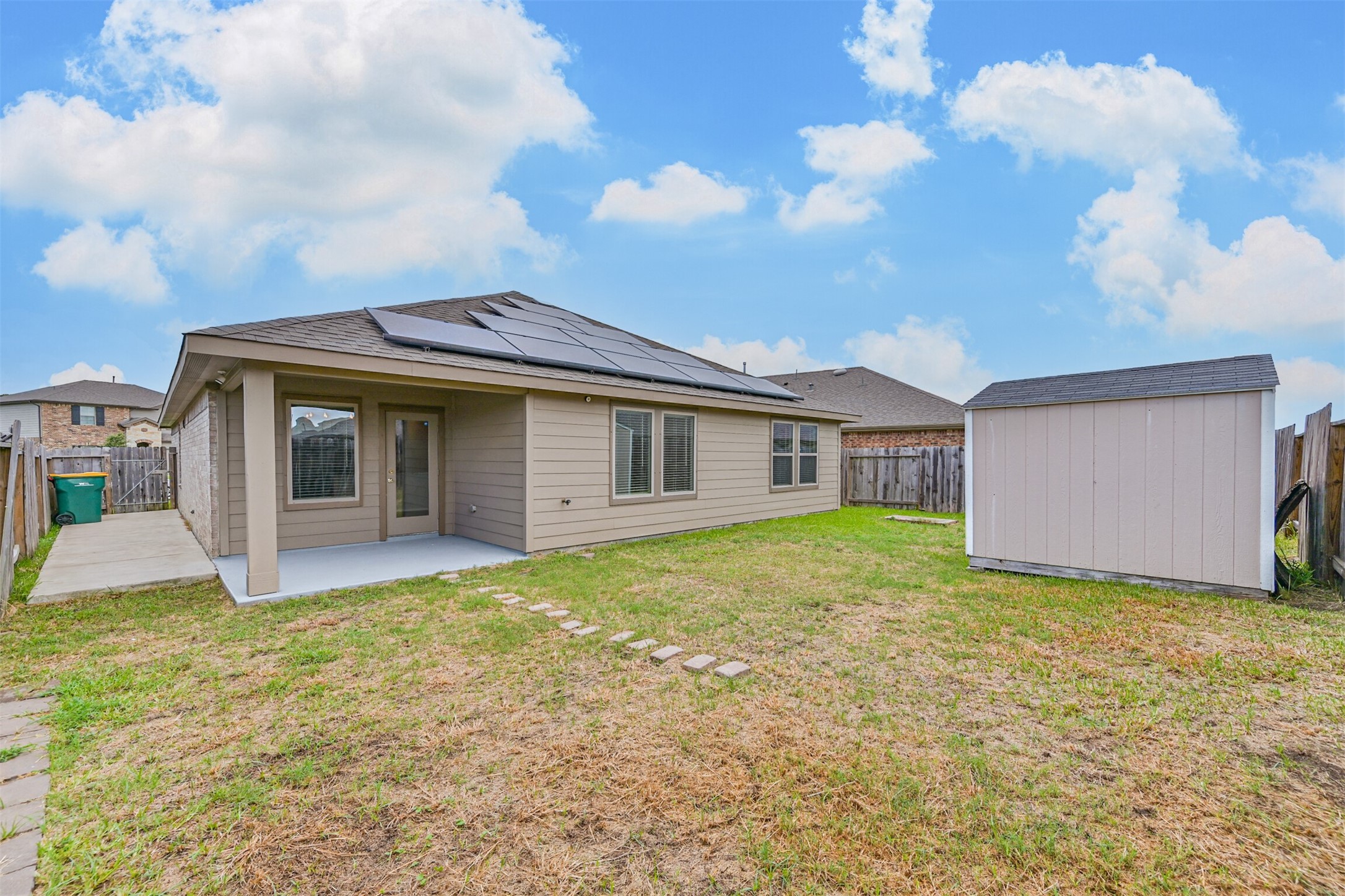 3930 Hawaiian Court Baytown, TX 77521 - Photo 2 of 22 a front view of a house with a garden