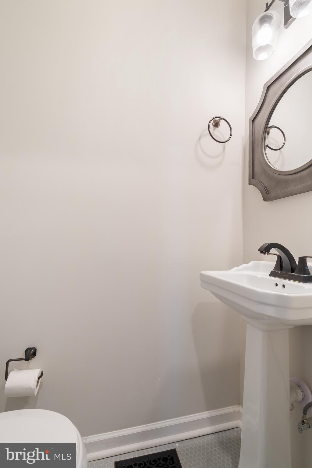 3803 Dorchester Road Baltimore, MD 21215 - Photo 16 of 45 Elegant Half Bath