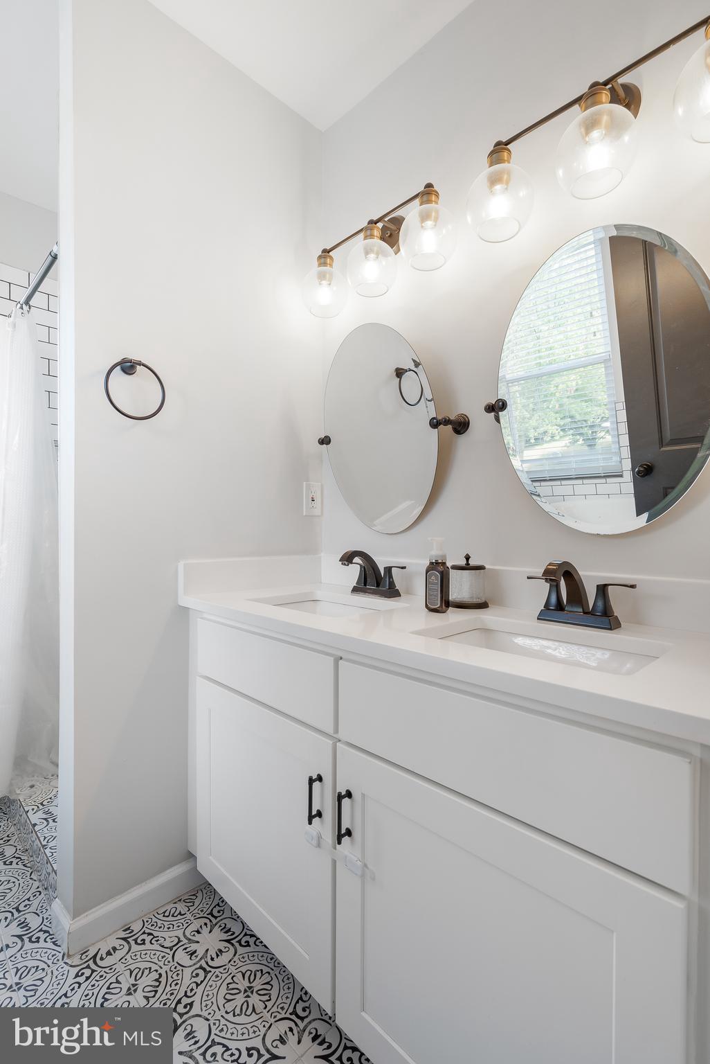 3803 Dorchester Road Baltimore, MD 21215 - Photo 26 of 45 Deluxe Primary Bathroom With Dual Sinks