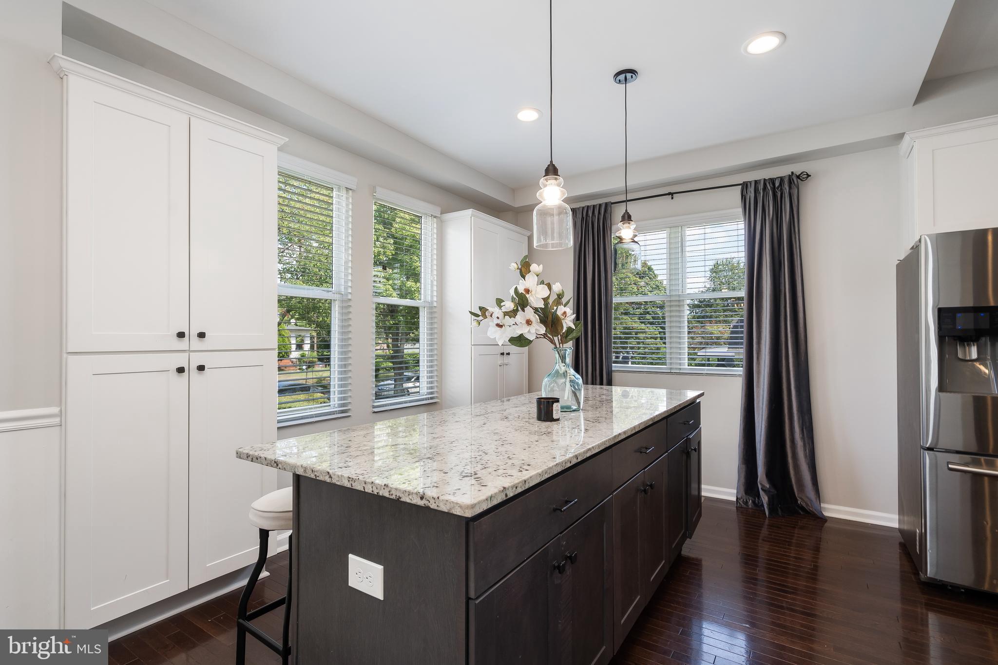 3803 Dorchester Road Baltimore, MD 21215 - Photo 9 of 45 Sun Filled Kitchen with Island and Custom Cabinets
