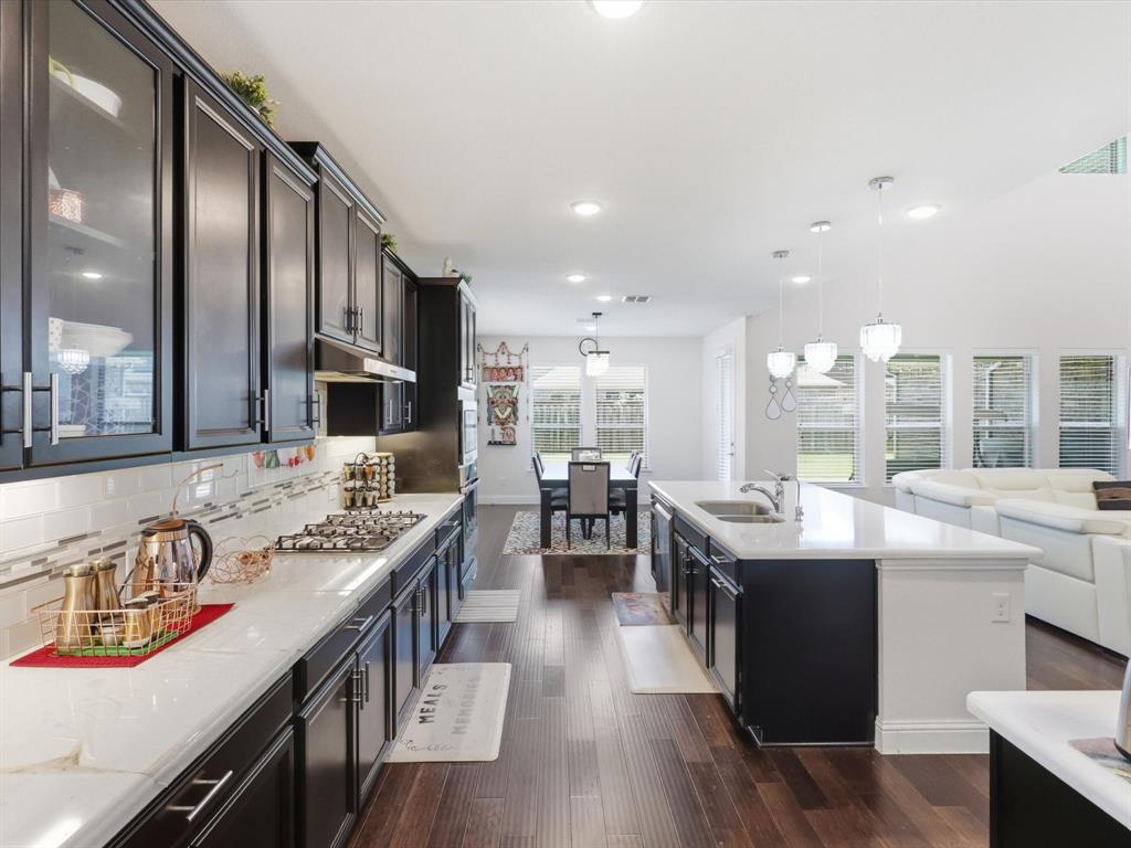 16458 Ryder Rock Road Frisco, TX 75033 - Photo 5 of 25 Large Kitchen Looking into Breakfast Nook