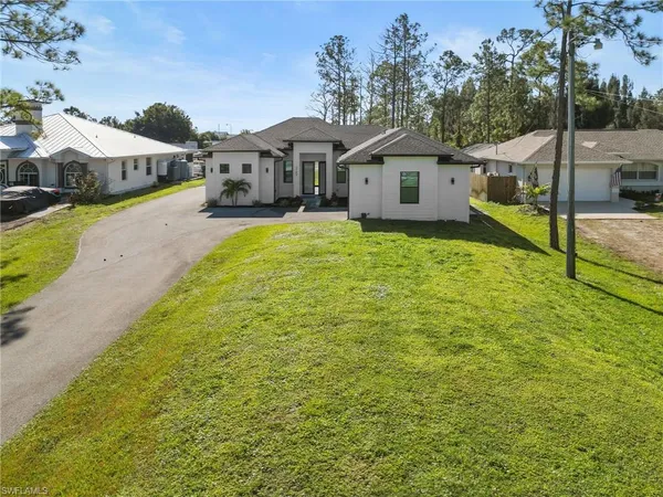 a bathroom with a sink and a yard