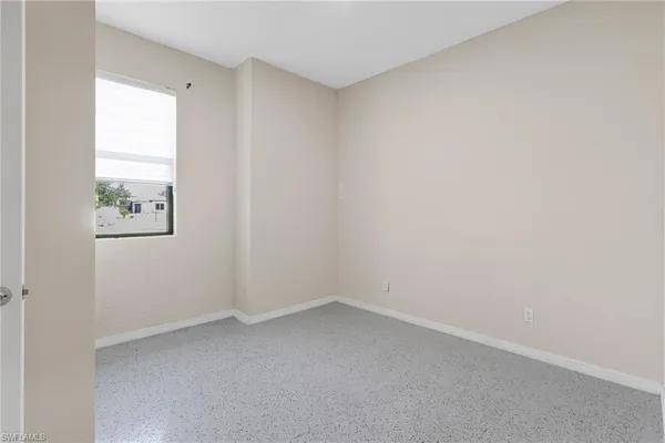 an empty room with a window