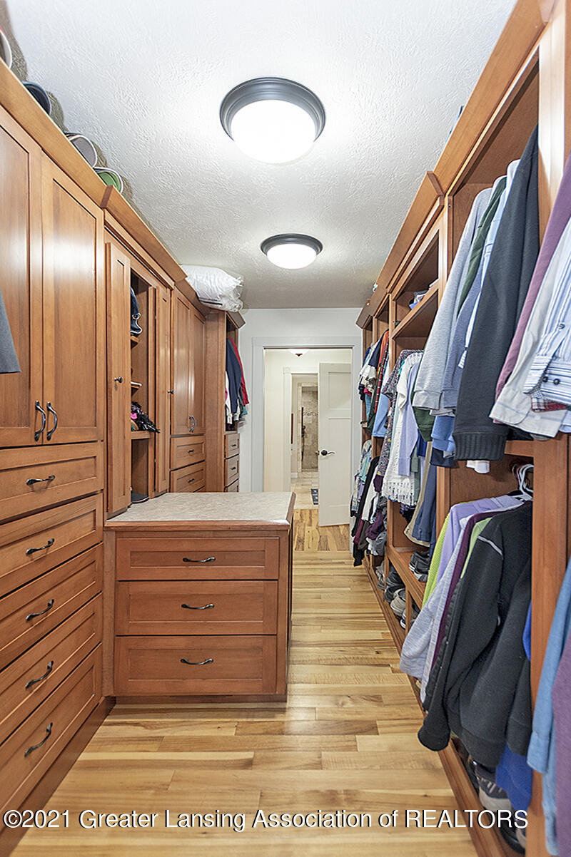4890 Nichols Road Mason, MI 48854 - Photo 20 of 45 Amazing master closet storage