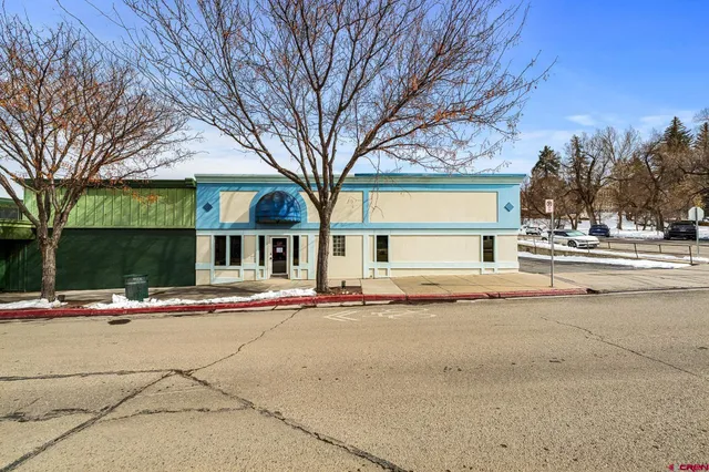 a front view of a building with street view