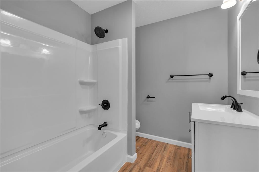 1119 Riverside Drive Beaver, PA 15009 - Photo 14 of 26 a bathroom with a tub sink and vanity