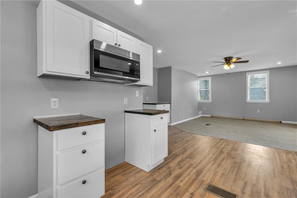 1119 Riverside Drive Beaver, PA 15009 - Photo 8 of 26 a view of a kitchen with wooden floor and electronic appliances