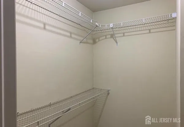 a view of a room with racks on the wall