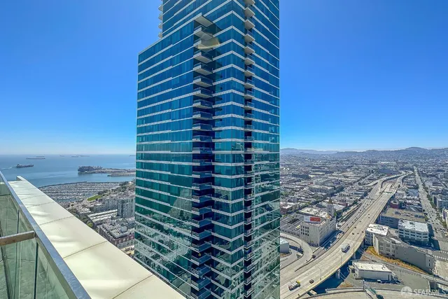 a view of city with ocean view