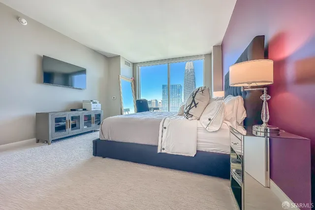 a bedroom with furniture and a sink