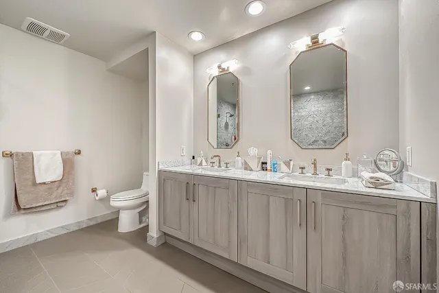 a view of a hallway with washer and dryer