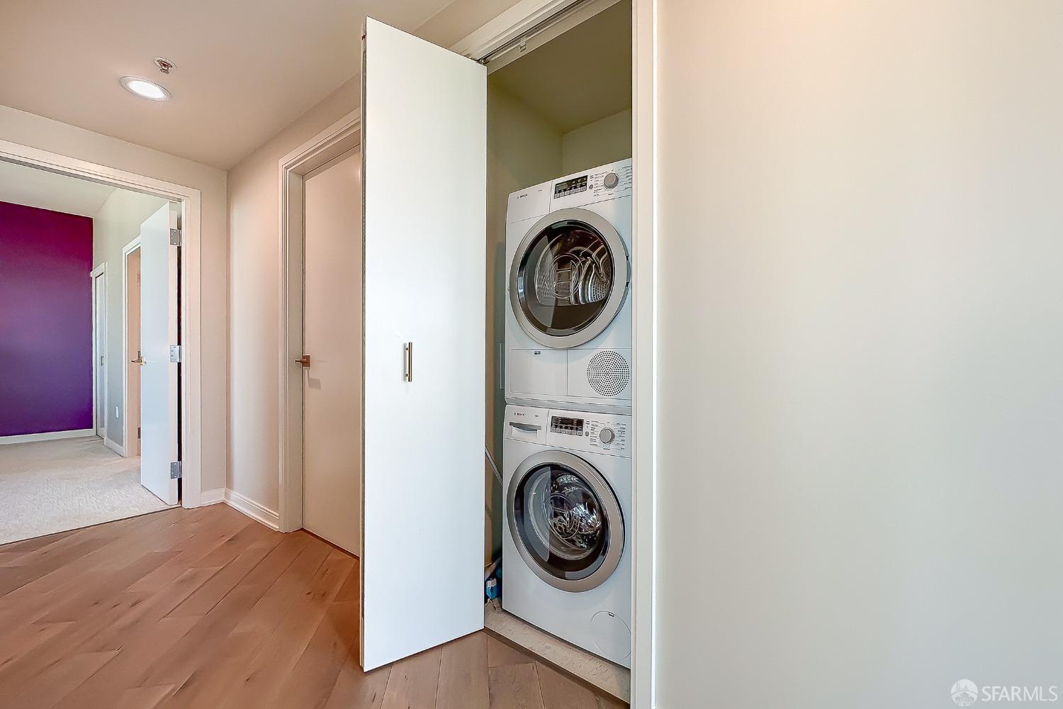 401 Harrison Street, Unit 44A San Francisco, CA 94105 - Photo 31 of 42 a view of a hallway with washer and dryer