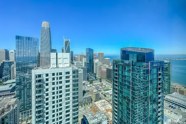a view of a hallway with a black white checkered floor