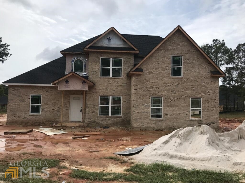 113 Timber Ridge Circle Byron, GA 31008 - Photo 1 of 1 a front view of a house with a yard