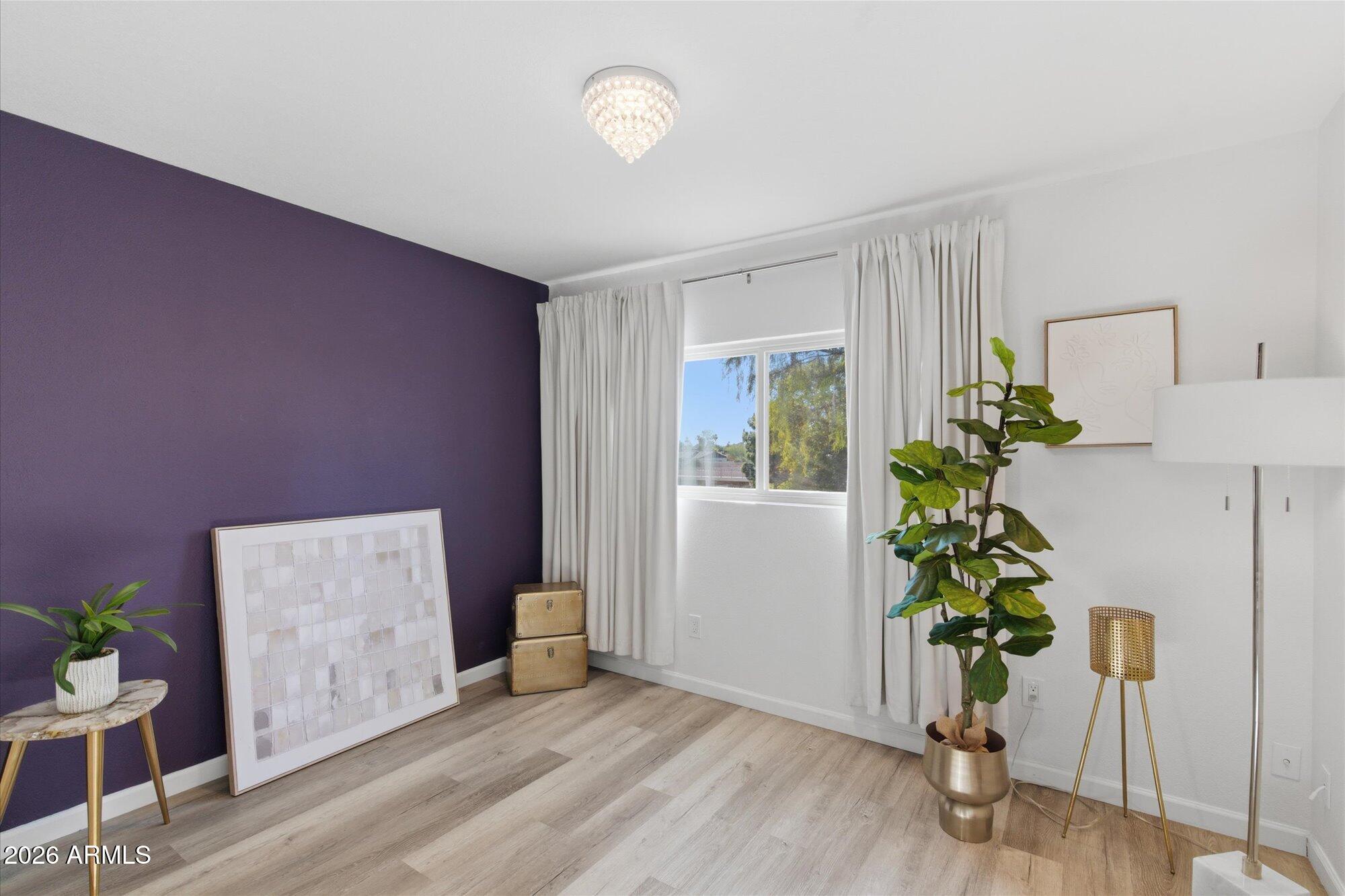 4019 East Charter Oak Road Phoenix, AZ 85032 - Photo 15 of 23 a view of an entryway with wooden floor