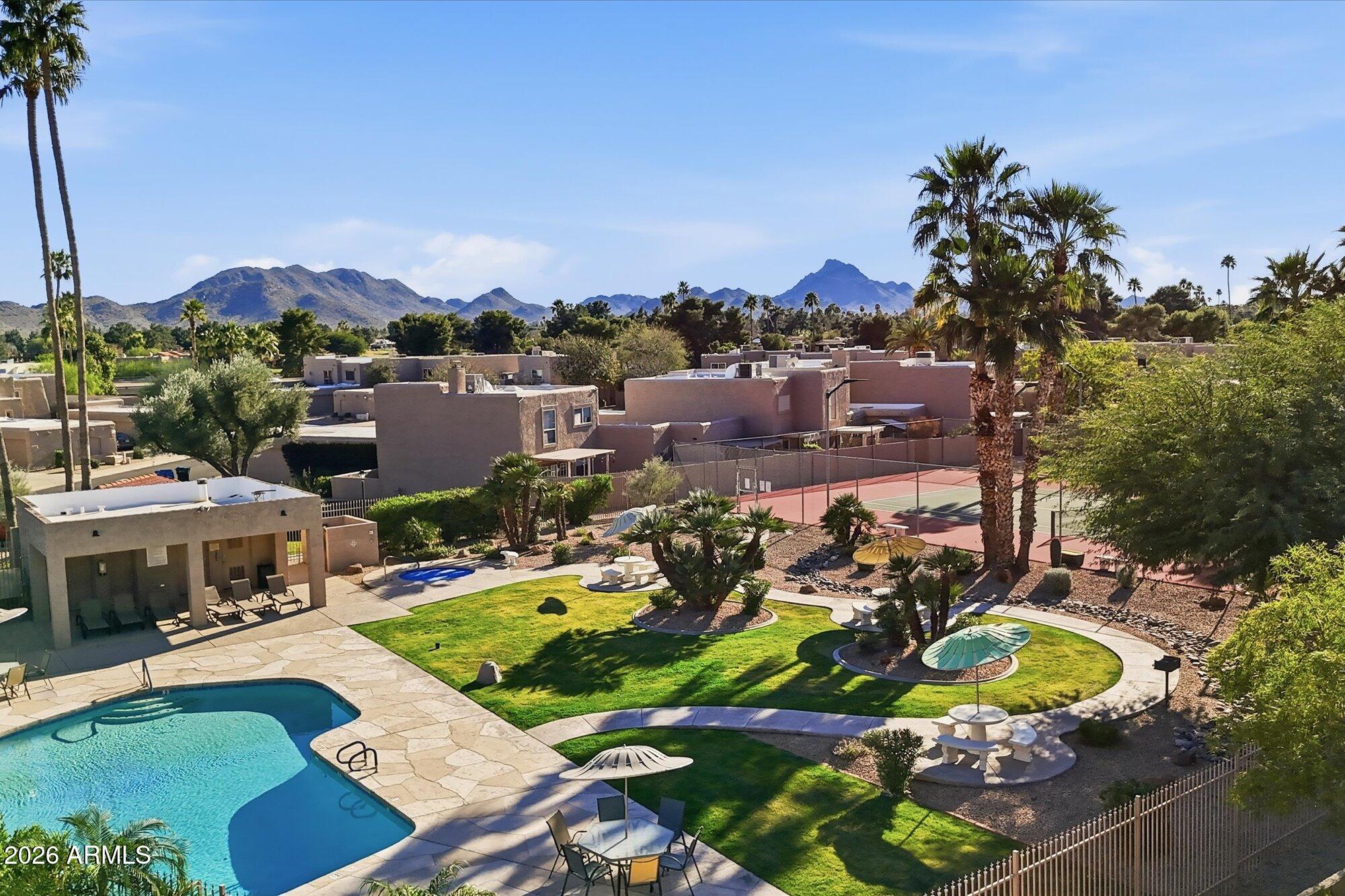 4019 East Charter Oak Road Phoenix, AZ 85032 - Photo 21 of 23 a view of a lake with houses