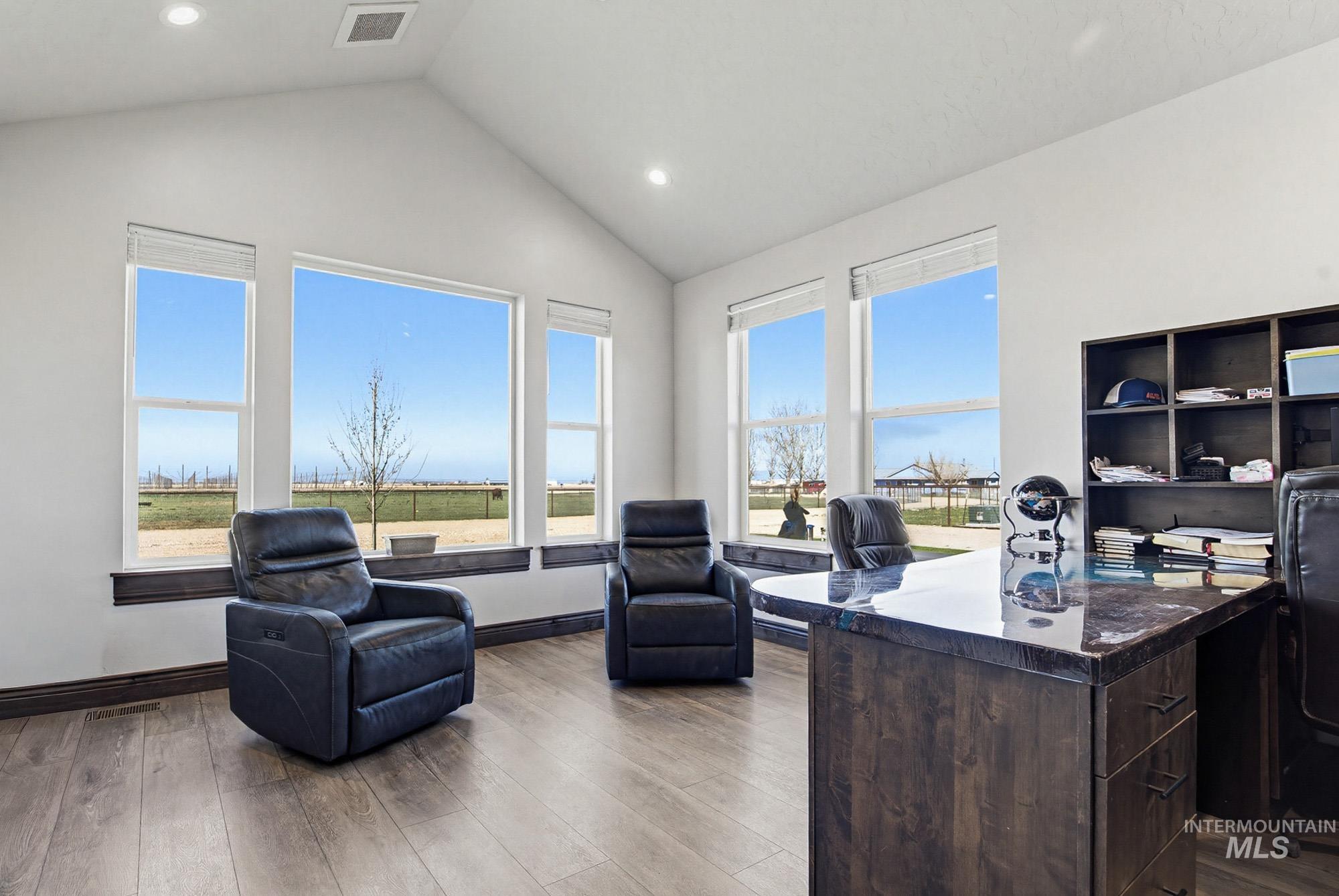 24753 Simplot Boulevard Wilder, ID 83676 - Photo 15 of 47 Office area featuring dark wood-style flooring, recessed lighting, and plenty of natural light