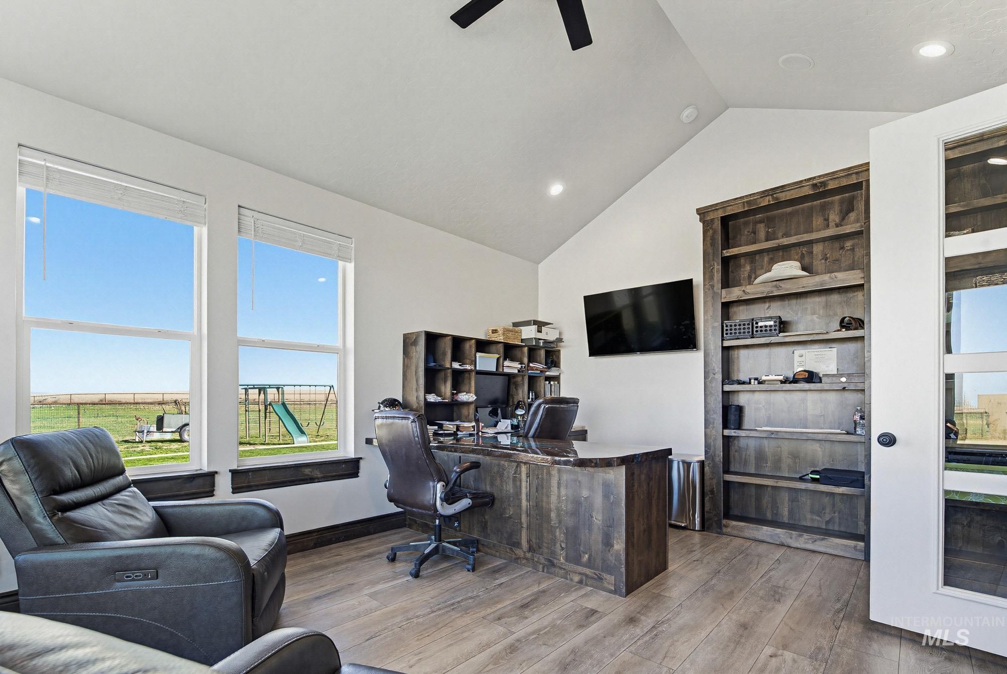 24753 Simplot Boulevard Wilder, ID 83676 - Photo 16 of 47 Home office with light wood finished floors, recessed lighting, and ceiling fan