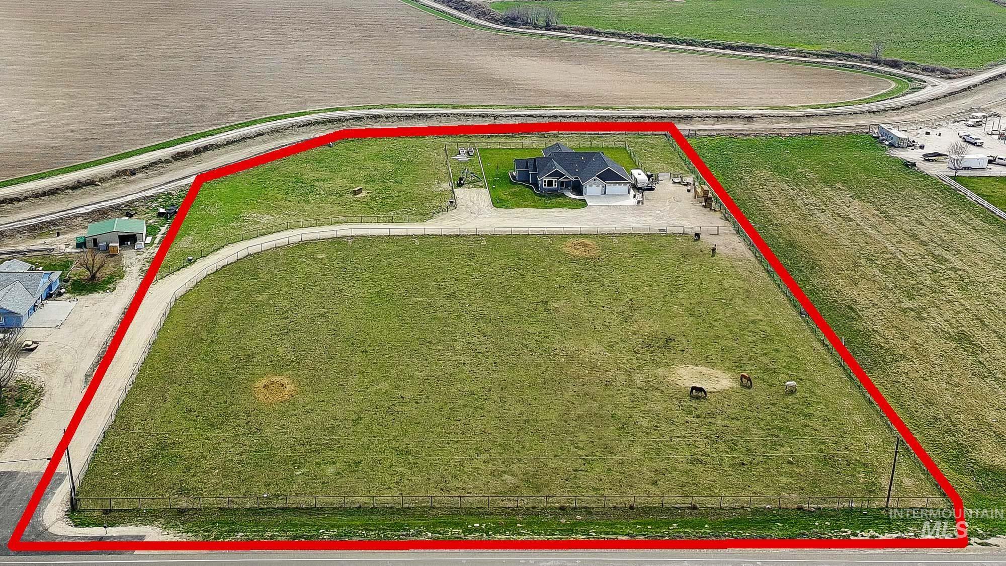 24753 Simplot Boulevard Wilder, ID 83676 - Photo 43 of 47 Aerial view of sparsely populated area with property boundaries highlighted