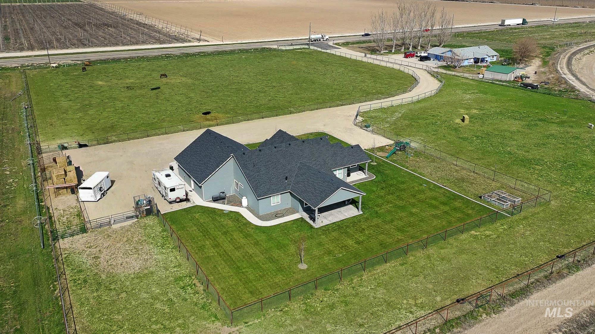 24753 Simplot Boulevard Wilder, ID 83676 - Photo 47 of 47 Aerial view of sparsely populated area with large plots for crops
