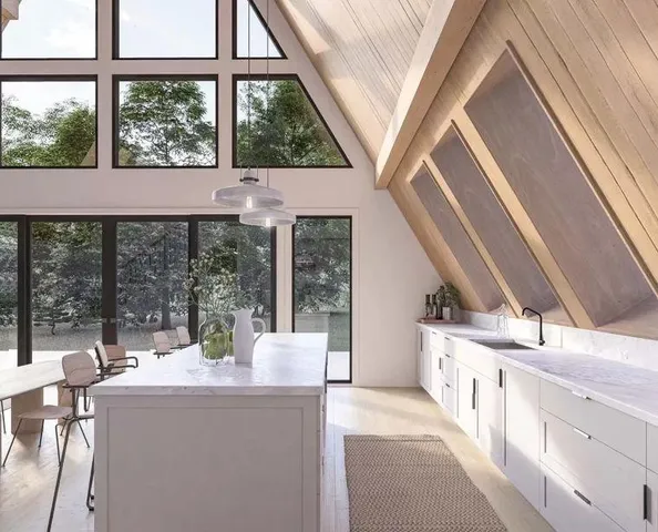 a view of living room with furniture and large windows