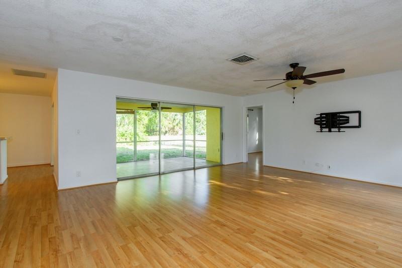 1700 Southwest 13th Place Boca Raton, FL 33486 - Photo 4 of 16 03_1700SW13thPlace_1_LivingRoom_FlexMLS8
