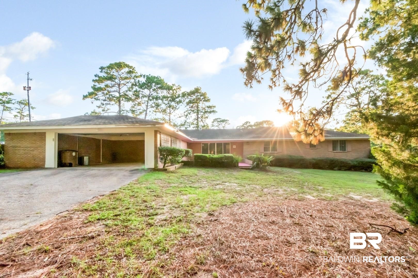 241 Suzanne Circle Mobile, AL 36608 - Photo 37 of 41 Ranch-style home featuring driveway, a carport, and a front yard