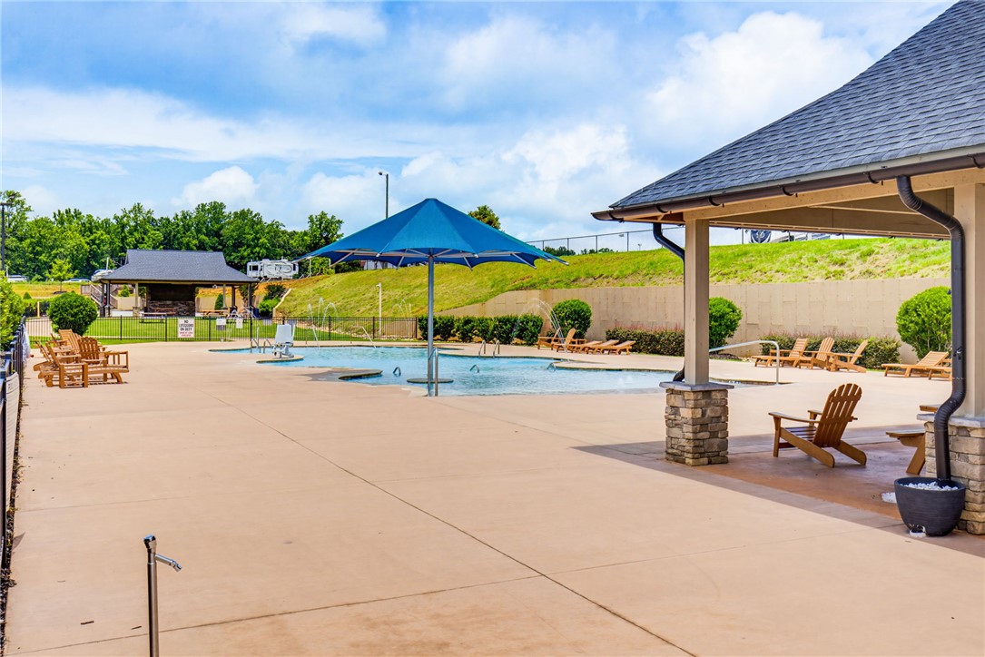 150 Dalton Drive, Unit 331/332 Pendleton, SC 29670 - Photo 24 of 29 A refreshing outdoor pool area with ample lounging space, perfect for leisure.